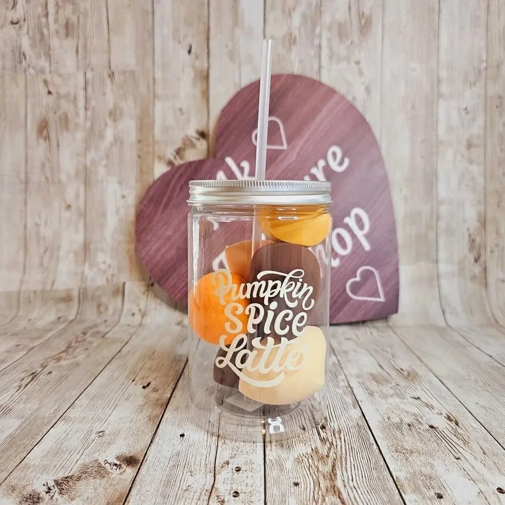 Pumpkin spice latte cup with makeup sponges